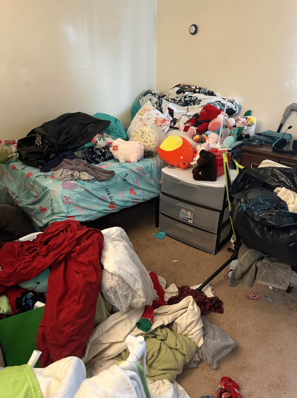 Child's bedroom in Binghamton, NY needing organizing services and structure before Decluttering Chaos arrived to help